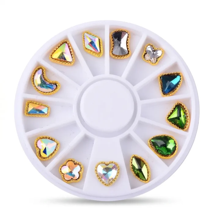 Meem'z Gold-Framed Mixed Shape Aurora Rhinestone Wheel showing 12 compartments with framed heart teardrop square and chevron crystal rhinestones