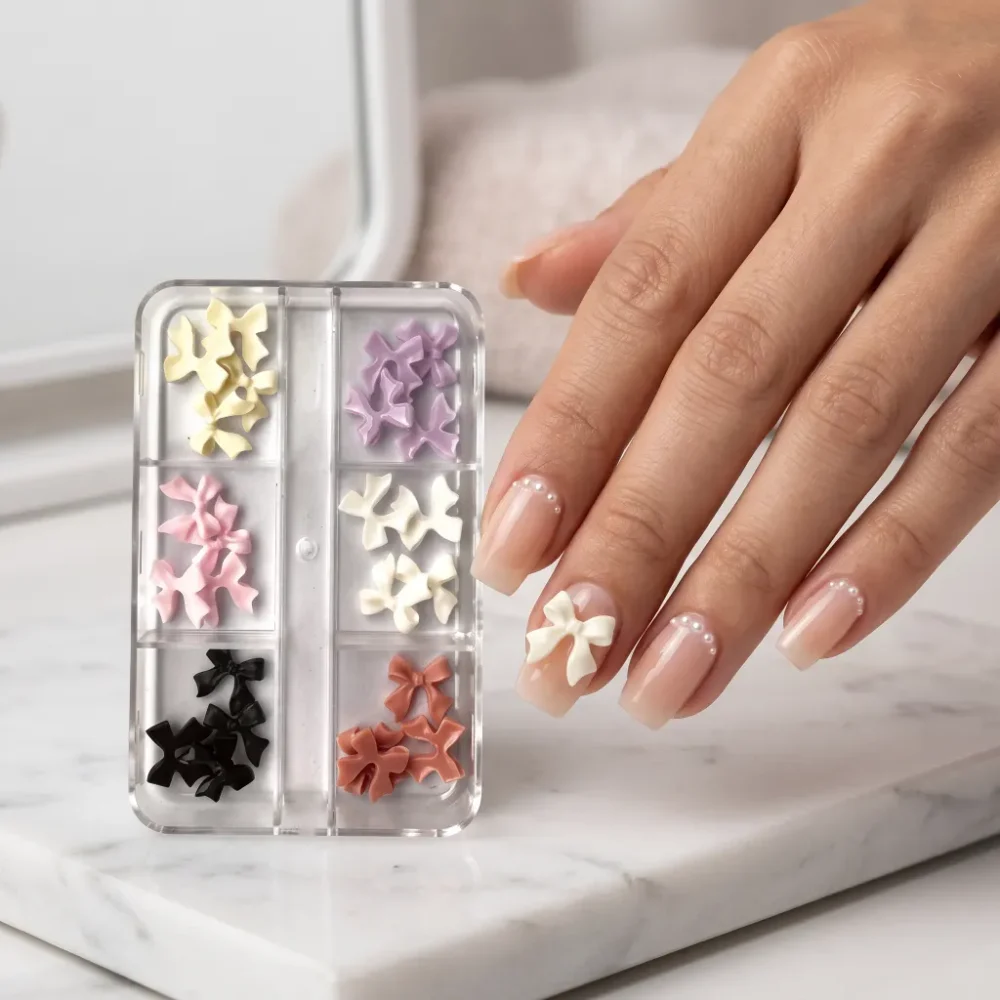 Meem'z 3D Resin Ribbon Bow Nail Charm Set showing six compartments with cream lilac pink white black and brown bow charms