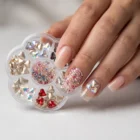 Meem'z Mixed Crystal Heart and Diamond Rhinestone Wheel showing 7 compartments with AB aurora red grey and champagne rhinestones
