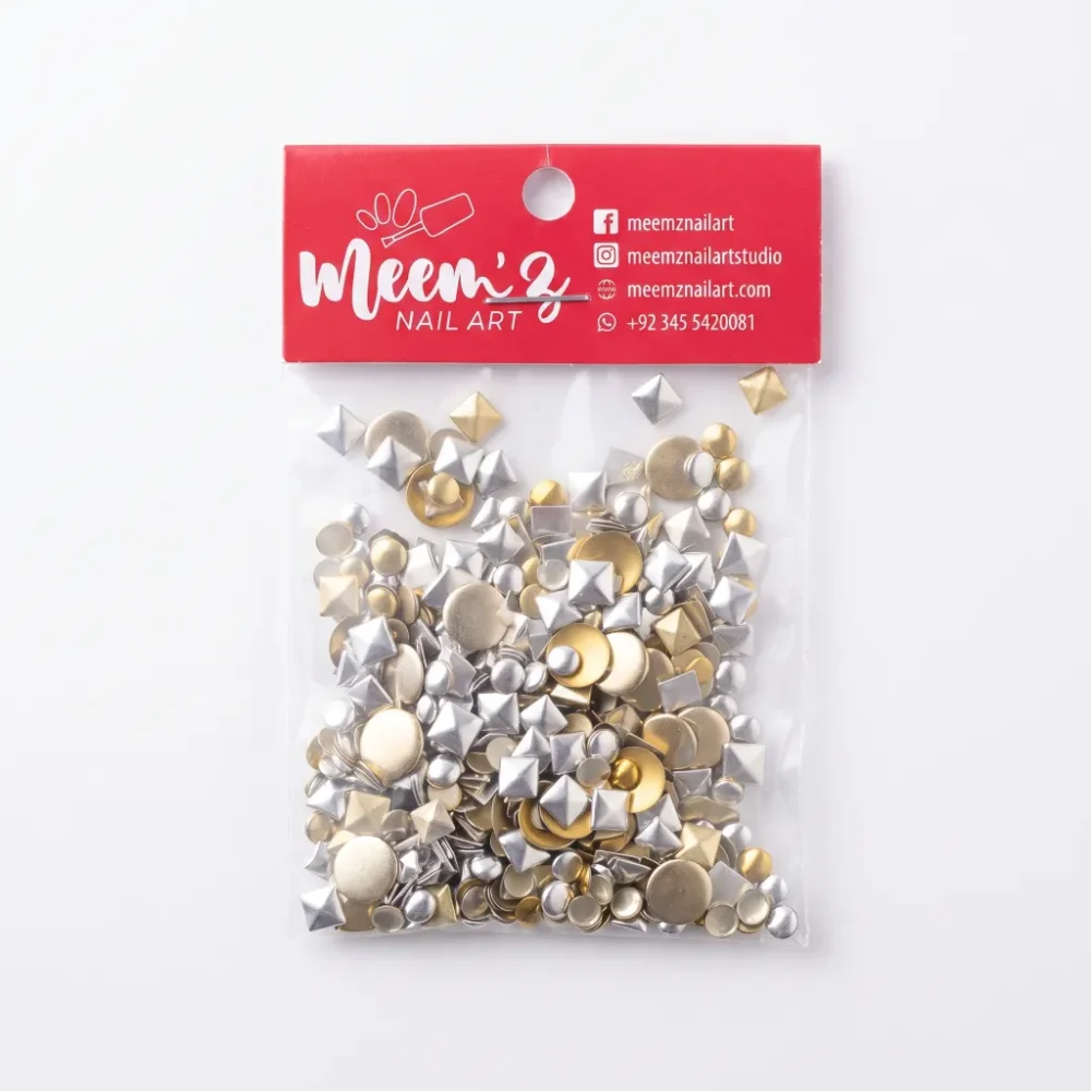 Close-up of silicone nail art mold cavities with seashell and flower shapes for 3D gel and acrylic nail art