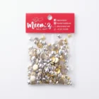 Close-up of silicone nail art mold cavities with seashell and flower shapes for 3D gel and acrylic nail art
