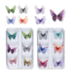 Purple chiffon fabric butterfly nail charm raised off a marble purple gel nail with rhinestone accents
