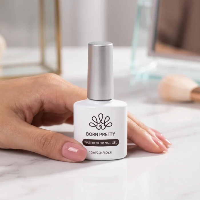 Born Pretty Water Blooming Gel 10ml Blooming gel is one of the most creative specialty products in nail art. It creates the ink blooming effect where gel colours dropped onto a wet blooming gel base flow outward organically in soft fluid patterns that replicate the look of ink dropped into water. The results are different every time which is part of what makes this technique so popular. No two blooming gel nail sets look exactly the same. How Blooming Gel Works The blooming gel acts as a reactive wet surface that allows gel colours to flow and blend across it in organic patterns. Apply a layer of blooming gel over a cured base and do not cure the blooming gel. While the blooming gel is still wet, drop or paint small amounts of gel colour onto the surface. The colour immediately begins to bloom and spread outward through the wet blooming gel, creating natural flowing patterns. Once happy with the pattern cure everything together. Effects You Can Create Marble and stone nail art with natural veining patterns Watercolour wash effects with soft blended colour transitions Ink bloom designs with organic spreading colour patterns Abstract art nail designs with unpredictable organic shapes Ombre and gradient effects with soft diffused colour transitions Negative space designs where colour blooms only in specific areas Key Specifications Brand: Born Pretty Volume: 10ml Type: Blooming and reactive nail art gel Effect: Water bloom, marble, ink drop nail art Cure: UV or LED lamp after design is complete Tips for Best Results Work quickly once the blooming gel is applied as it begins to self-level and can change the bloom pattern if left too long before adding colour. Use thin, concentrated drops of gel colour for precise bloom control. Adding more colour creates more dramatic spreading patterns. For a subtle watercolour effect use very small amounts of diluted colour. Once cured the blooming pattern is locked permanently and can be sealed with any top coat. Important Do not cure the blooming gel layer before adding your colours. The wet blooming gel must remain uncured for the blooming reaction to occur. Curing it first sets the gel and the bloom effect will not work on a cured surface.